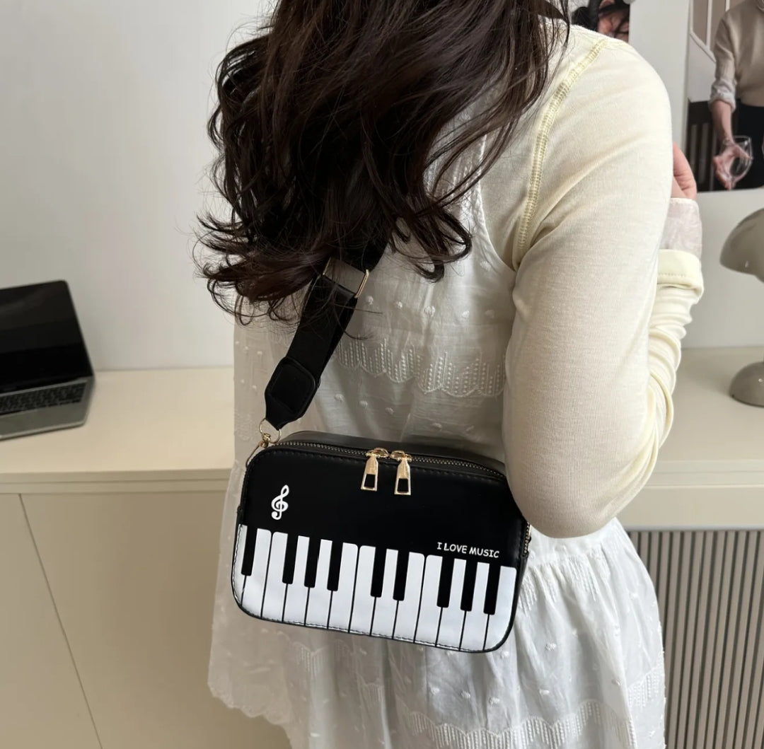 Cartera bandolera piano #CodU