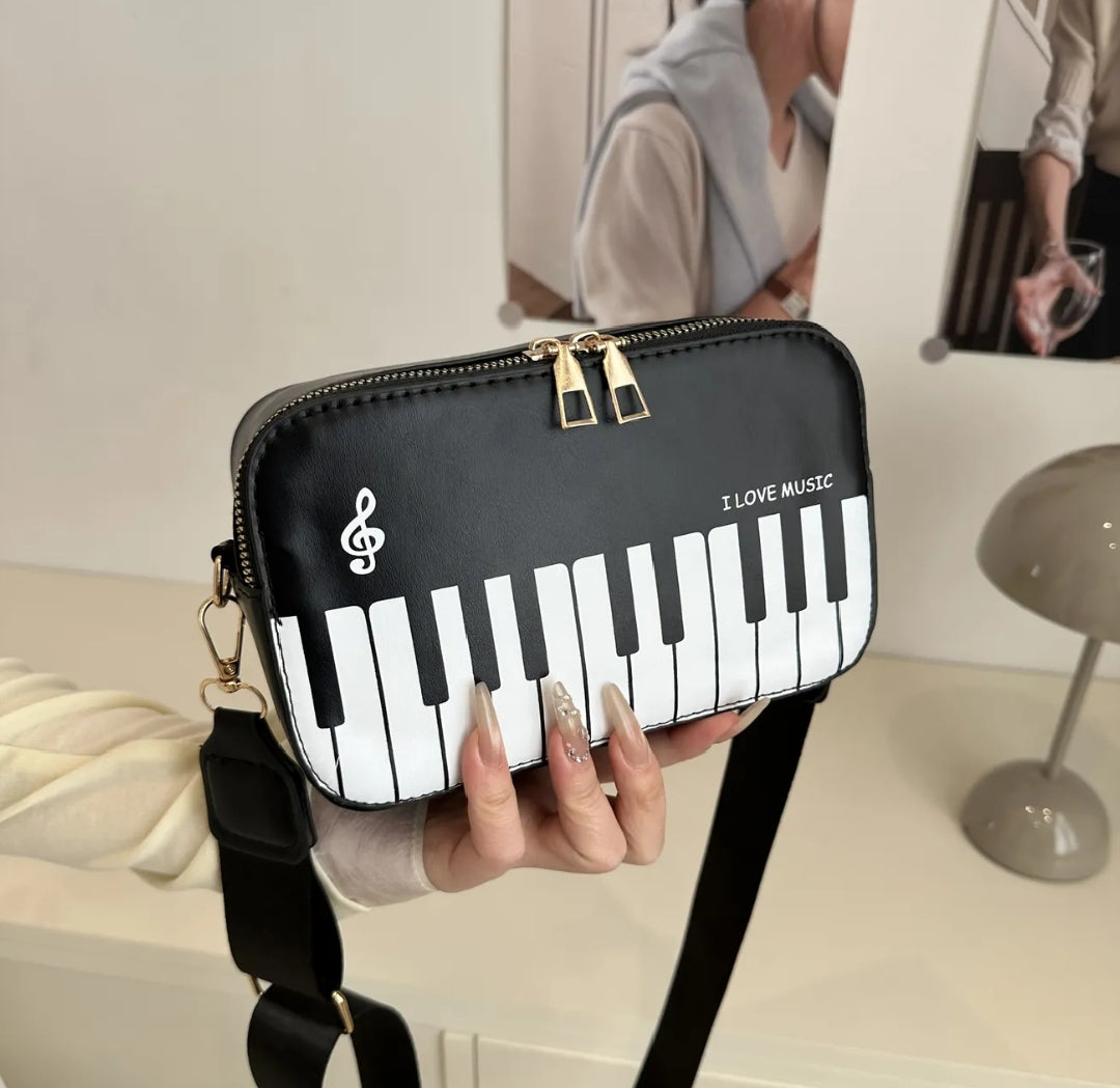 Cartera bandolera piano #CodU