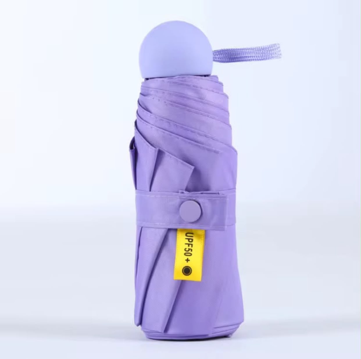 Mini paraguas con protección UV unicolor
