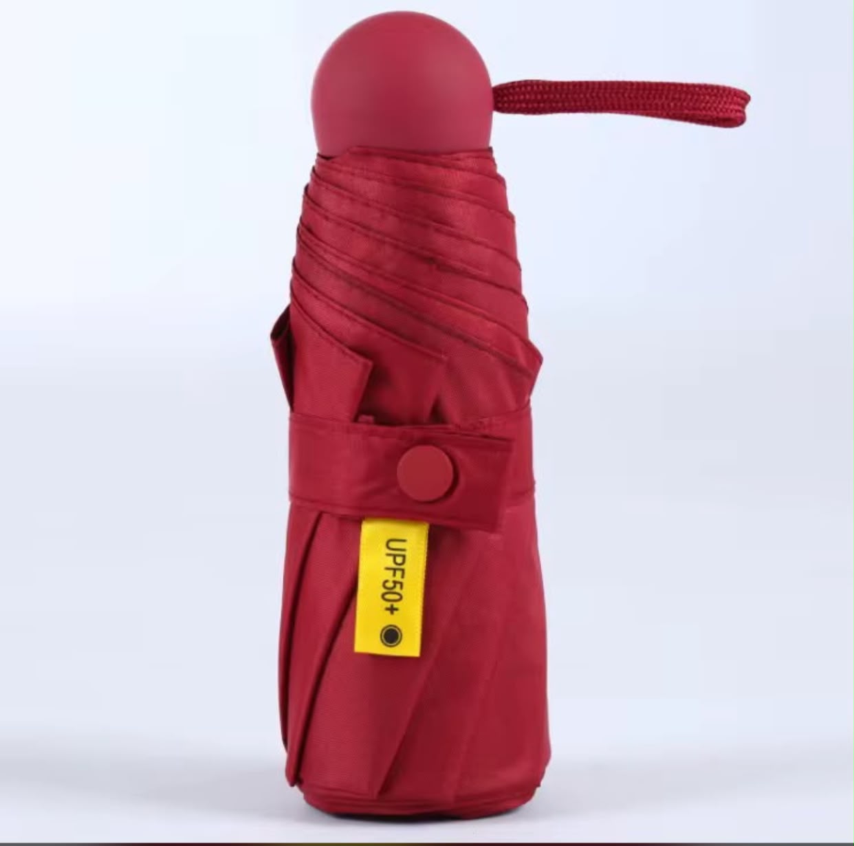 Mini paraguas con protección UV unicolor